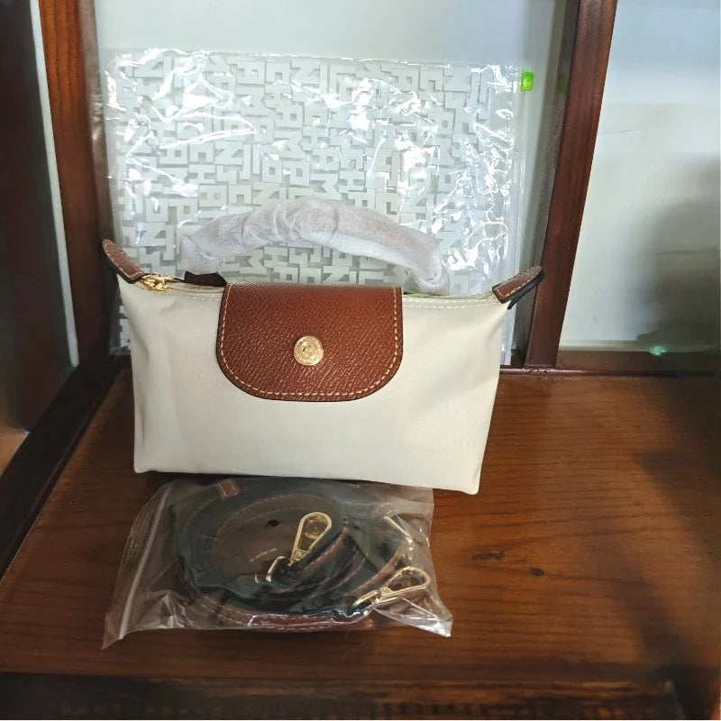 Mini moño de nailon para mujer, bolso de un solo hombro no perforado, multifuncional, para primavera y otoño