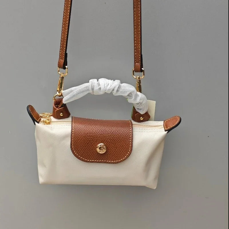 Mini moño de nailon para mujer, bolso de un solo hombro no perforado, multifuncional, para primavera y otoño