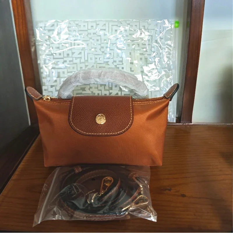 Mini moño de nailon para mujer, bolso de un solo hombro no perforado, multifuncional, para primavera y otoño