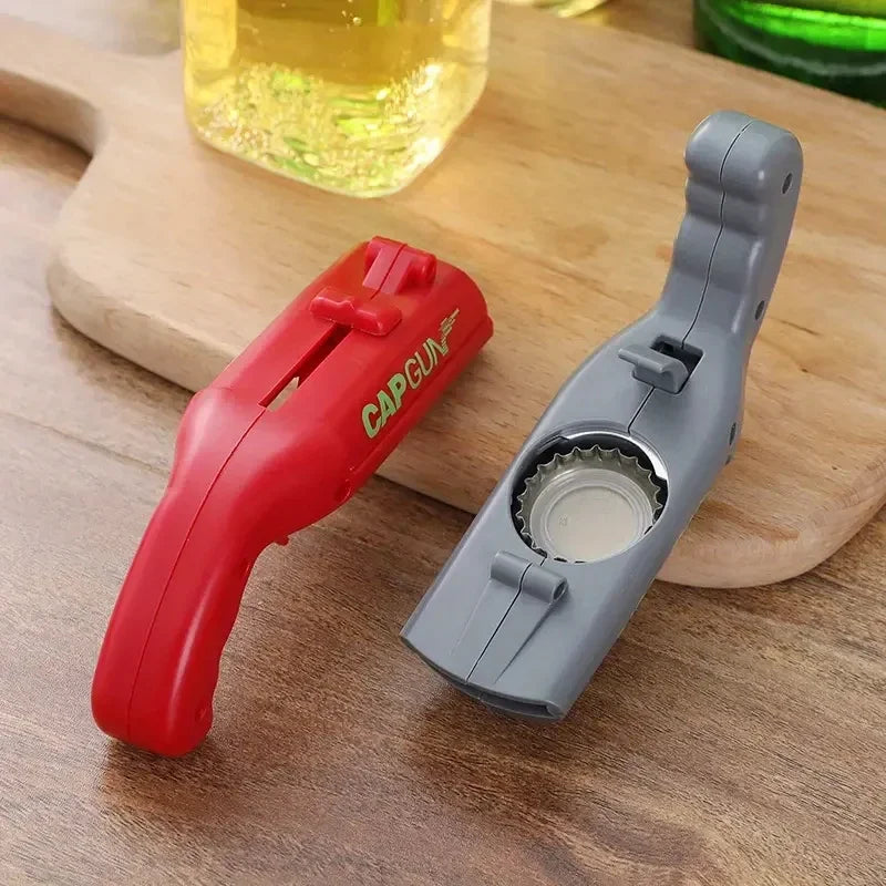 1 abridor de cerveza, lanzador de tapas voladoras, juego de beber para fiestas, juguete de cocina, accesorios de bar, destapador de pistola.