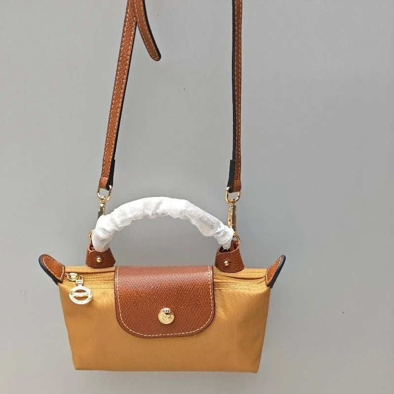 Mini moño de nailon para mujer, bolso de un solo hombro no perforado, multifuncional, para primavera y otoño