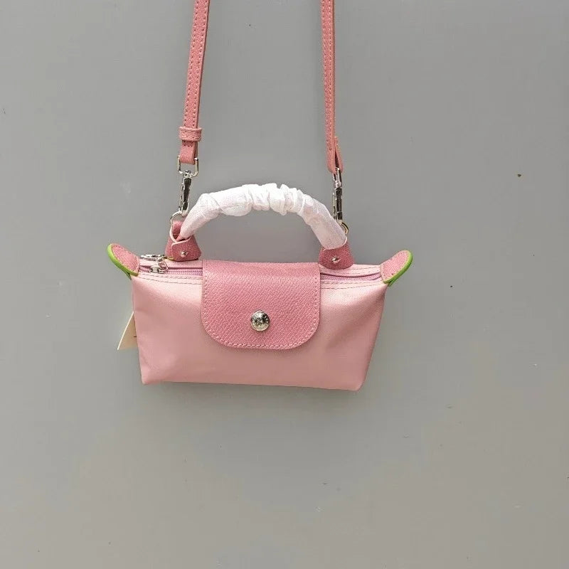 Mini moño de nailon para mujer, bolso de un solo hombro no perforado, multifuncional, para primavera y otoño