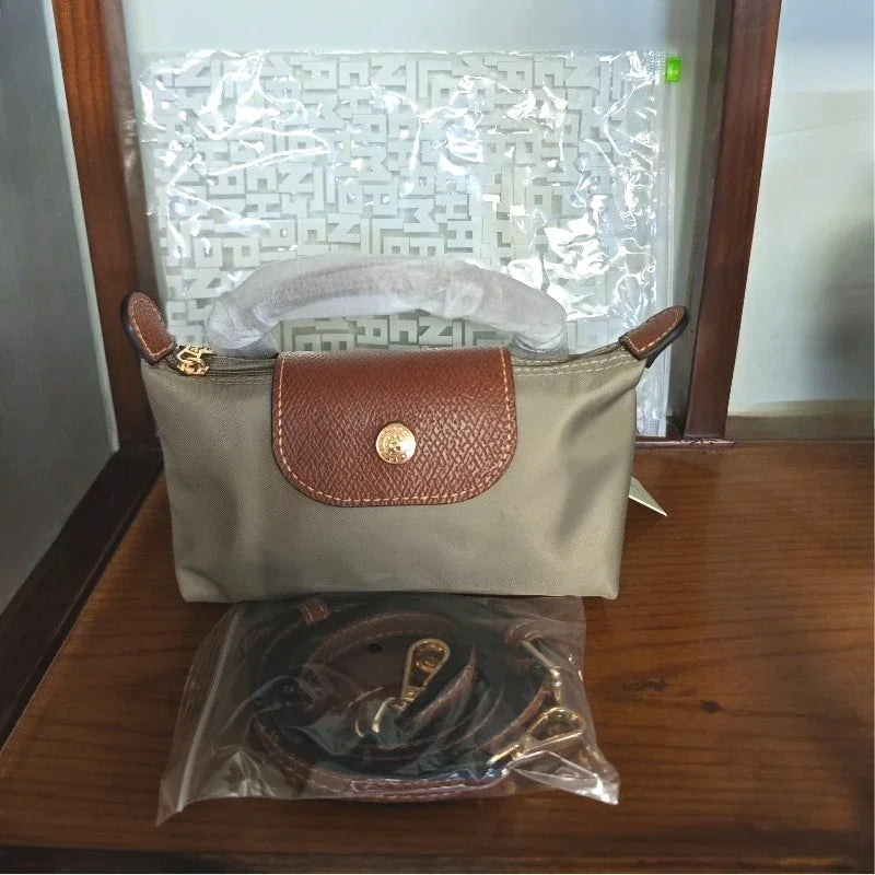 Mini moño de nailon para mujer, bolso de un solo hombro no perforado, multifuncional, para primavera y otoño