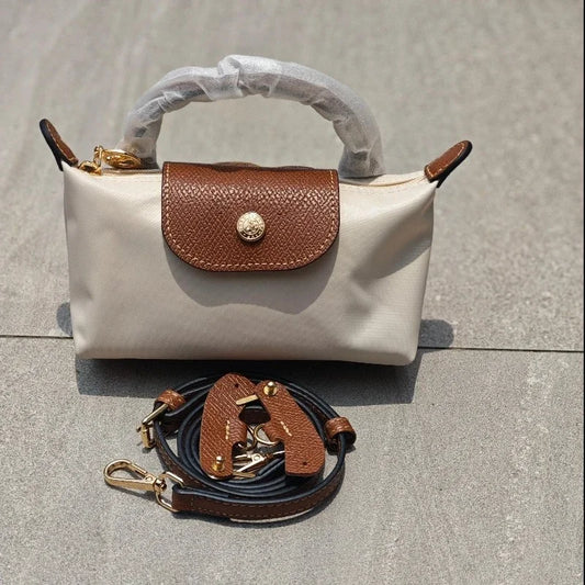 Mini moño de nailon para mujer, bolso de un solo hombro no perforado, multifuncional, para primavera y otoño