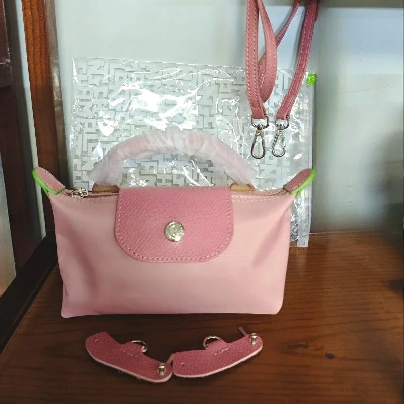 Mini moño de nailon para mujer, bolso de un solo hombro no perforado, multifuncional, para primavera y otoño
