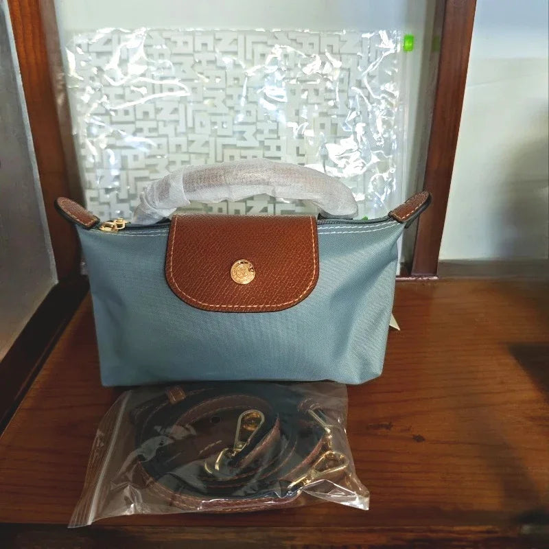 Mini moño de nailon para mujer, bolso de un solo hombro no perforado, multifuncional, para primavera y otoño